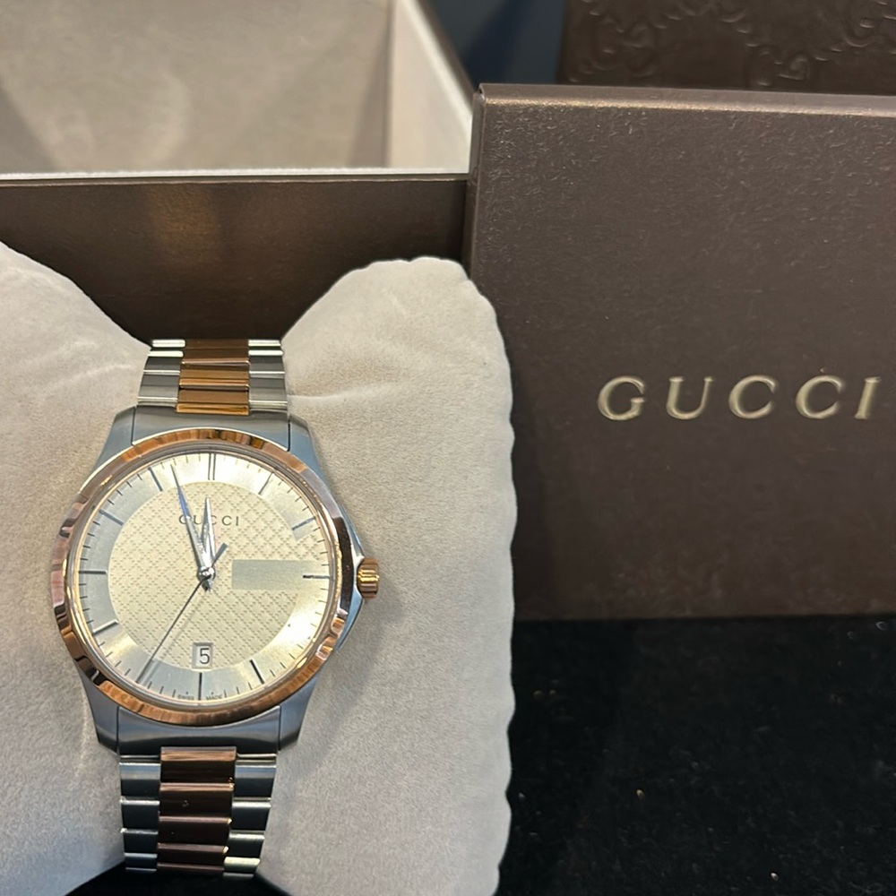 Gucci men watch. New with original box and tag.